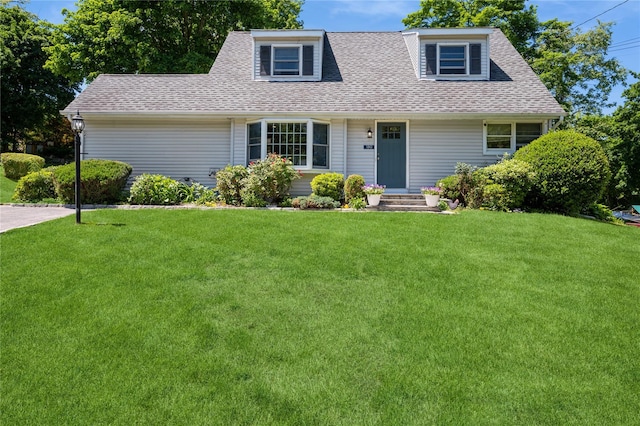 130 Rita Dr, Cortlandt Manor, NY 10567 - view of front of home featuring a shingled roof and a front yard