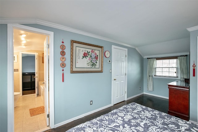 6 Willow Dr, Massapequa Park, NY 11762 - bedroom with vaulted ceiling, crown molding, baseboards, and connected bathroom