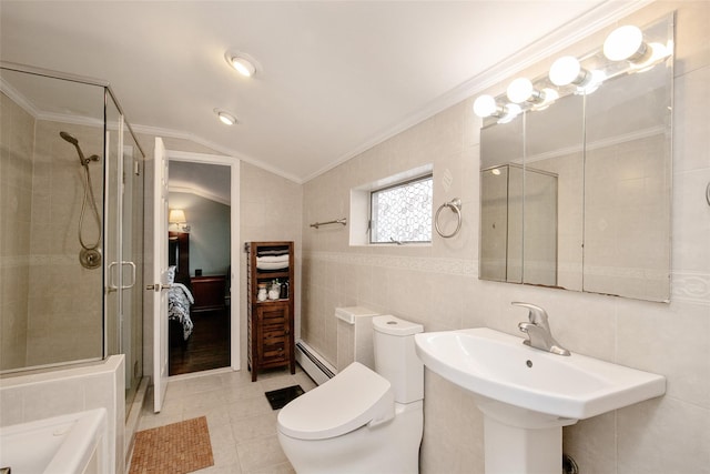 6 Willow Dr, Massapequa Park, NY 11762 - full bathroom featuring tile walls, a shower stall, toilet, baseboard heating, and a sink