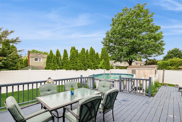 6 Willow Dr, Massapequa Park, NY 11762 - wooden terrace featuring a fenced backyard and outdoor dining area