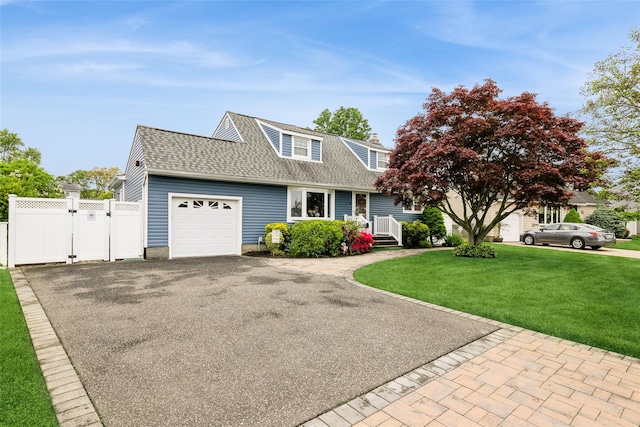 6 Willow Dr, Massapequa Park, NY 11762 - view of front of house with a garage, asphalt driveway, a gate, and roof with shingles