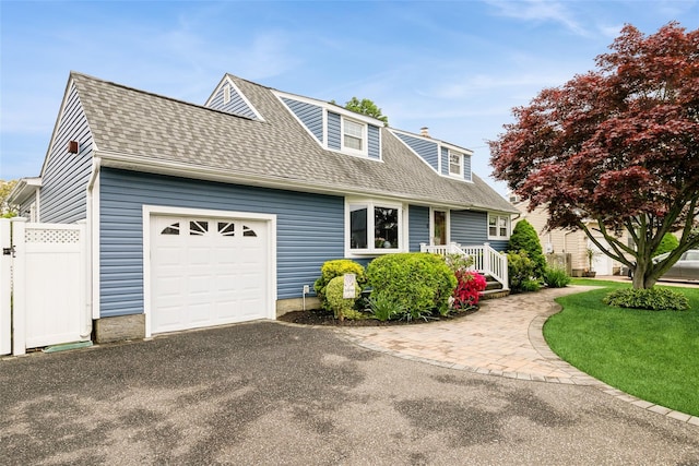 6 Willow Dr, Massapequa Park, NY 11762 - view of front of property featuring an attached garage, a shingled roof, and asphalt driveway