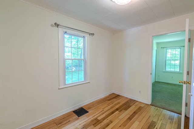 6 Knolls Rd, Poughkeepsie, NY 12601 - unfurnished room with crown molding, light wood-type flooring, and baseboards