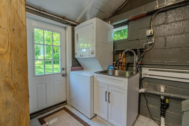 6 Knolls Rd, Poughkeepsie, NY 12601 - laundry room featuring estacked washer and dryer and a sink