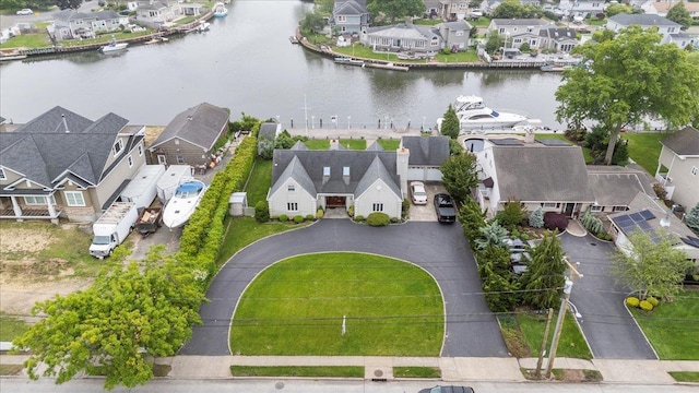 4520 Merrick Rd, Massapequa, NY 11758 - aerial perspective of suburban area with a nearby body of water
