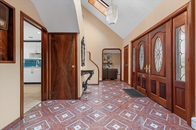 4520 Merrick Rd, Massapequa, NY 11758 - entrance foyer with high vaulted ceiling