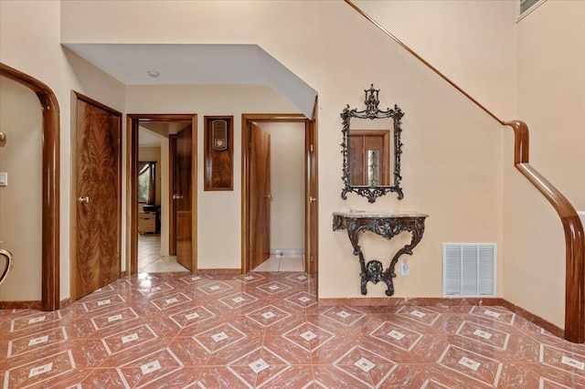 4520 Merrick Rd, Massapequa, NY 11758 - hall featuring baseboards and tile patterned floors
