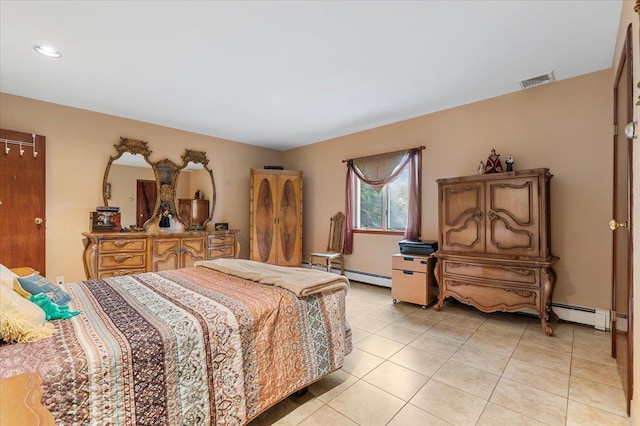 4520 Merrick Rd, Massapequa, NY 11758 - bedroom featuring baseboard heating and light tile patterned floors