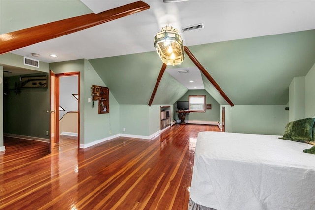4520 Merrick Rd, Massapequa, NY 11758 - bedroom with wood finished floors, lofted ceiling, baseboards, and baseboard heating