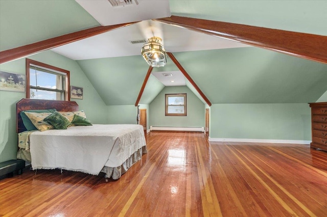 4520 Merrick Rd, Massapequa, NY 11758 - bedroom featuring a baseboard radiator, hardwood / wood-style flooring, vaulted ceiling, and baseboards