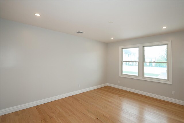 482 S 5th St, Lindenhurst, NY 11757 - unfurnished room with baseboards, light wood-type flooring, and recessed lighting