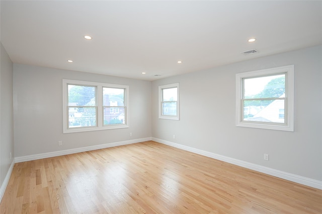 482 S 5th St, Lindenhurst, NY 11757 - spare room featuring baseboards, light wood finished floors, and recessed lighting