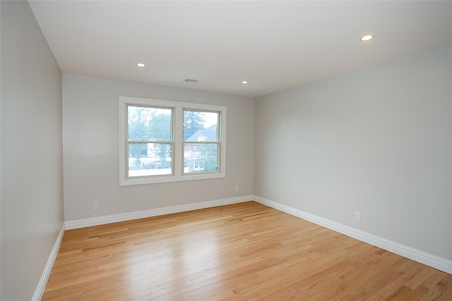 482 S 5th St, Lindenhurst, NY 11757 - spare room featuring light wood-style floors, baseboards, and recessed lighting