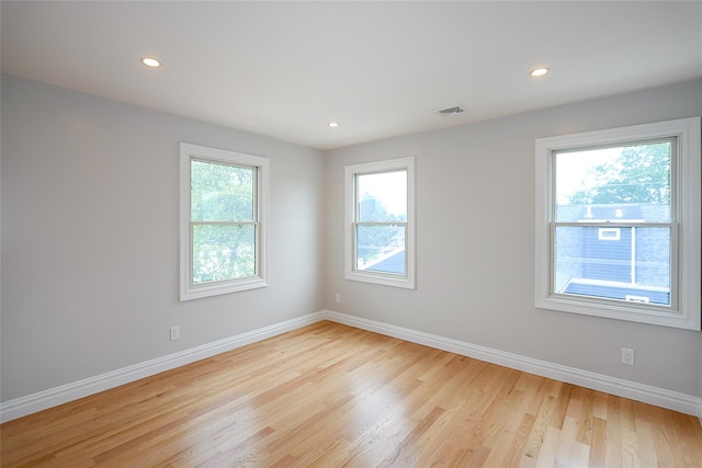 482 S 5th St, Lindenhurst, NY 11757 - unfurnished room with baseboards, light wood-style flooring, and recessed lighting