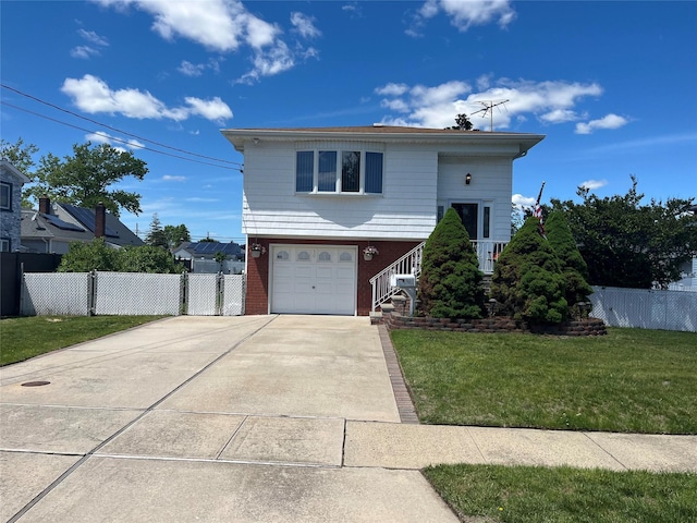 50 W Hampton Rd, Lindenhurst, NY 11747 - view of front of house with concrete driveway, an attached garage, and brick siding