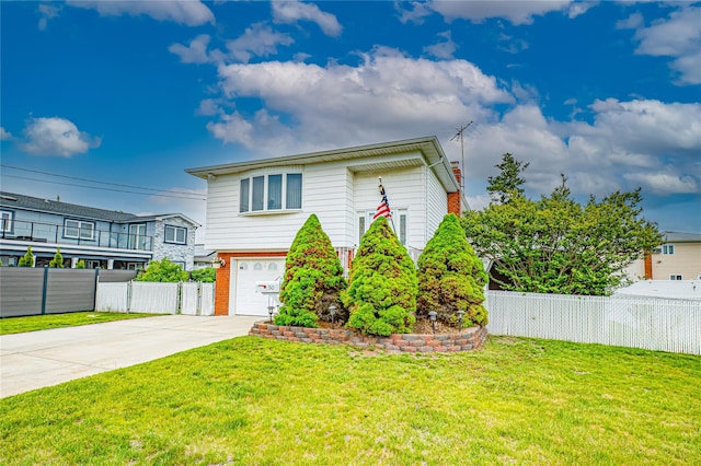 50 W Hampton Rd, Lindenhurst, NY 11747 - view of front of property featuring concrete driveway and a garage