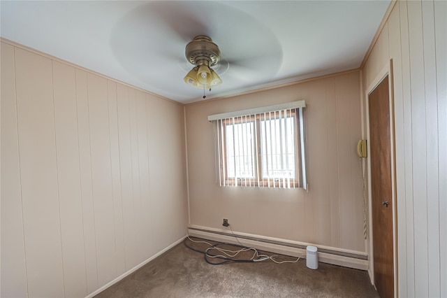 50 W Hampton Rd, Lindenhurst, NY 11747 - carpeted empty room featuring ceiling fan, baseboards, and a baseboard radiator