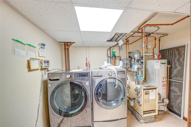 50 W Hampton Rd, Lindenhurst, NY 11747 - laundry room featuring gas water heater and washing machine and clothes dryer