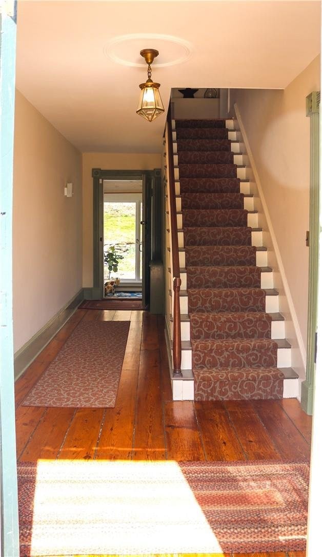 763 Old State Route 22, Dover Plains, NY 12522 - stairs with wood-type flooring and baseboards