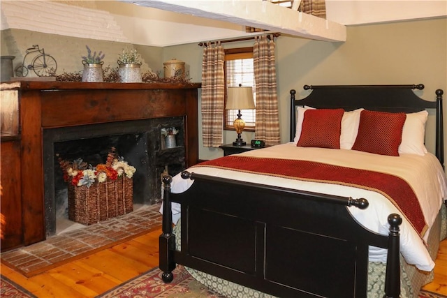763 Old State Route 22, Dover Plains, NY 12522 - bedroom featuring a fireplace and wood finished floors