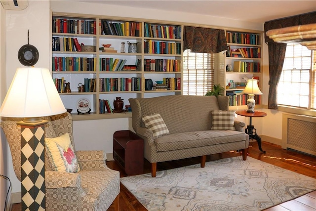 763 Old State Route 22, Dover Plains, NY 12522 - sitting room with radiator, wood finished floors, and baseboards