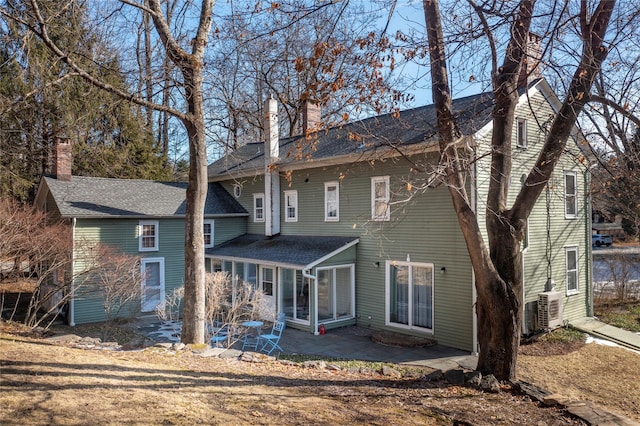 763 Old State Route 22, Dover Plains, NY 12522 - rear view of property with a patio area, a chimney, and roof with shingles