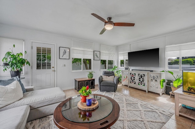 56 15th St, West Babylon, NY 11704 - tiled living room with a ceiling fan and healthy amount of natural light