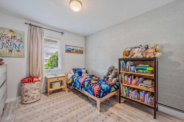 56 15th St, West Babylon, NY 11704 - bedroom with wood finished floors and baseboards