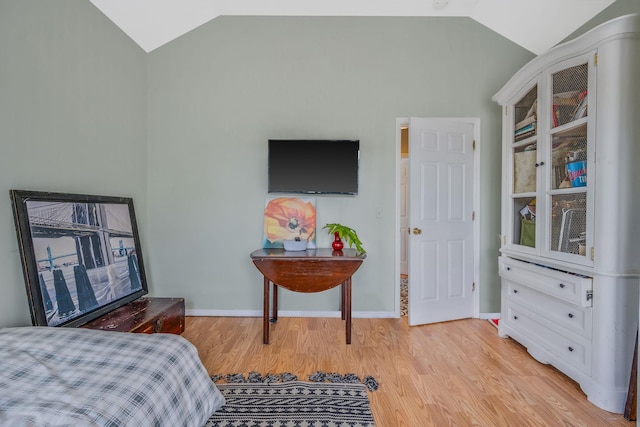 56 15th St, West Babylon, NY 11704 - bedroom featuring vaulted ceiling, light wood-style flooring, and baseboards