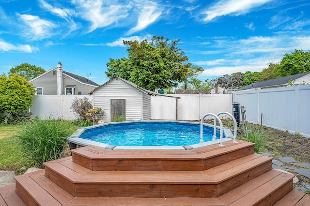 56 15th St, West Babylon, NY 11704 - view of swimming pool with a fenced backyard and a deck