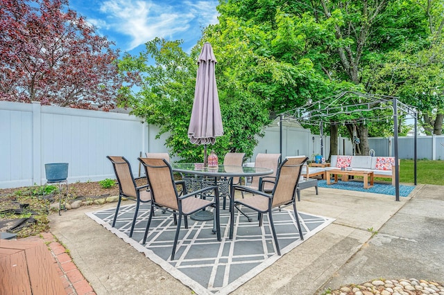 56 15th St, West Babylon, NY 11704 - fenced backyard with a patio and outdoor dining area