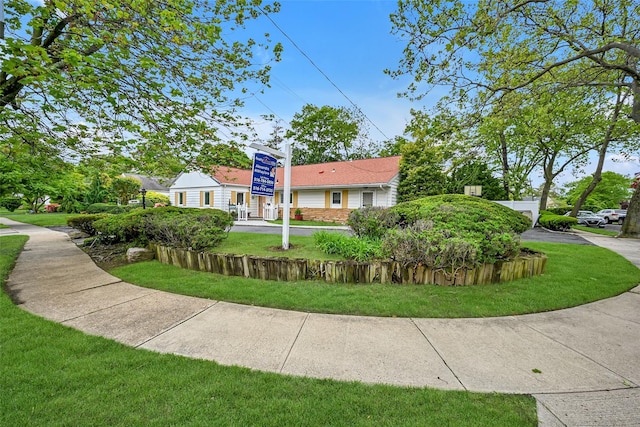 1608 Union Ave Unit 1608, Hewlett, NY 11557 - view of front of home featuring a front lawn