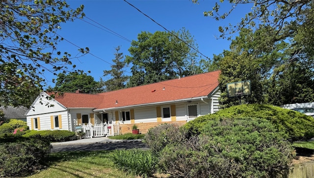 1608 Union Ave Unit 1608, Hewlett, NY 11557 - view of front of house with a chimney and brick siding