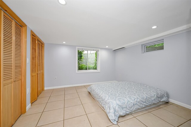1608 Union Ave Unit 1608, Hewlett, NY 11557 - bedroom featuring recessed lighting, light tile patterned floors, baseboards, and two closets