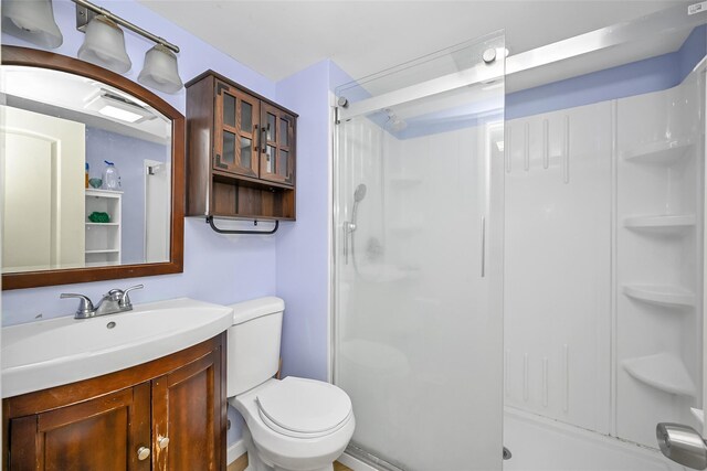 1608 Union Ave Unit 1608, Hewlett, NY 11557 - full bath featuring a shower, vanity, and toilet