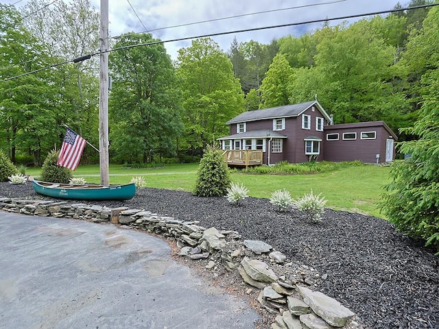 120 Spring Glen Rd, Mountain Dale, NY 12763 - view of green lawn featuring a wooden deck and a view of trees