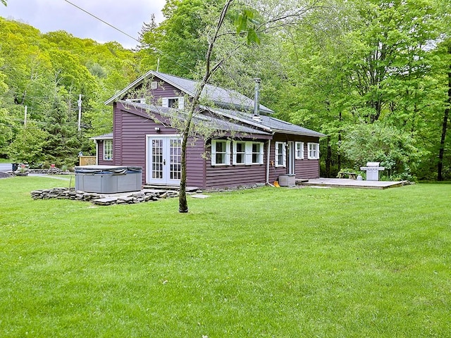 120 Spring Glen Rd, Mountain Dale, NY 12763 - rear view of house featuring french doors, a hot tub, a wooded view, a yard, and a deck