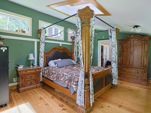 120 Spring Glen Rd, Mountain Dale, NY 12763 - bedroom with multiple windows, light wood-style flooring, and french doors