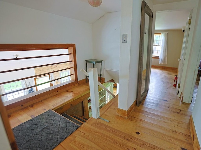 120 Spring Glen Rd, Mountain Dale, NY 12763 - hall featuring light wood-type flooring, vaulted ceiling, and an upstairs landing