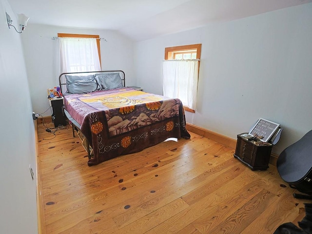 120 Spring Glen Rd, Mountain Dale, NY 12763 - bedroom featuring light wood-type flooring and vaulted ceiling
