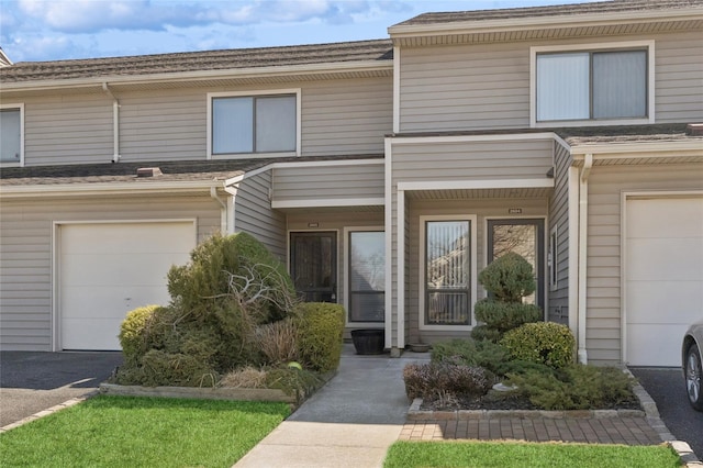 100 Daly Blvd Unit 2605, Oceanside, NY 11572 - townhome / multi-family property with a garage and driveway