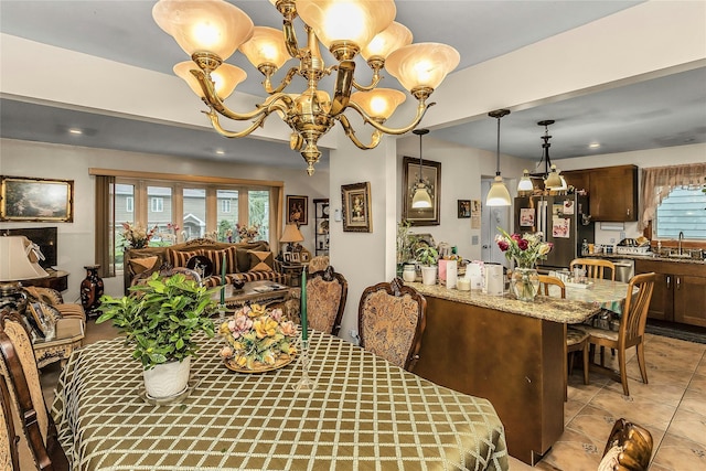 1150 Langdon St, Franklin Square, NY 11010 - dining room with a chandelier, light tile patterned flooring, and recessed lighting