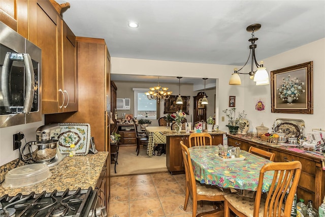 1150 Langdon St, Franklin Square, NY 11010 - dining space with a chandelier and light tile patterned floors