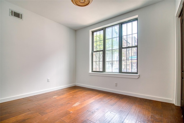 151 Noll St, Brooklyn, NY 11206 - spare room featuring hardwood / wood-style floors and baseboards