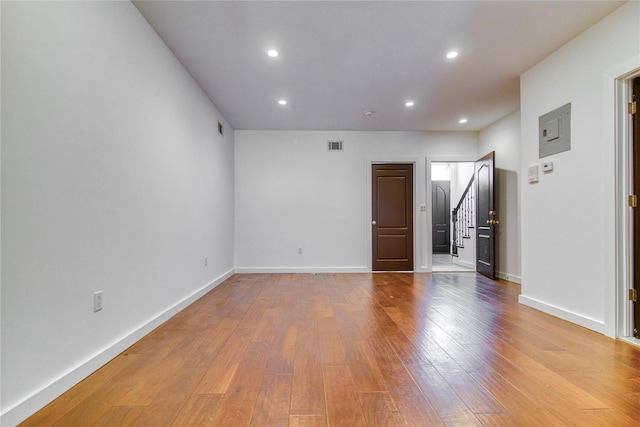 151 Noll St, Brooklyn, NY 11206 - unfurnished room featuring wood finished floors, recessed lighting, baseboards, and stairway