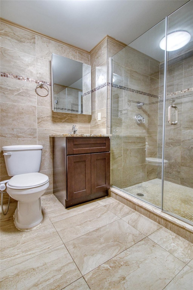 151 Noll St, Brooklyn, NY 11206 - bathroom featuring toilet, a shower stall, tile walls, and vanity