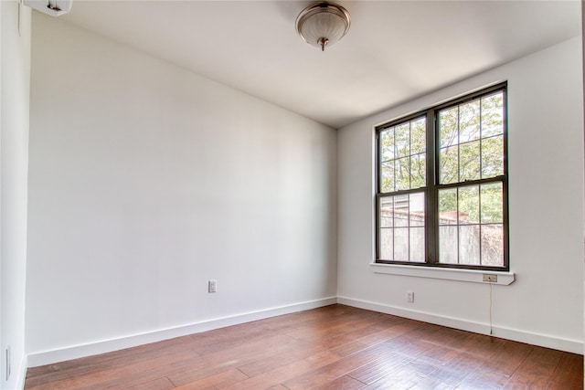 151 Noll St, Brooklyn, NY 11206 - spare room with hardwood / wood-style flooring and baseboards