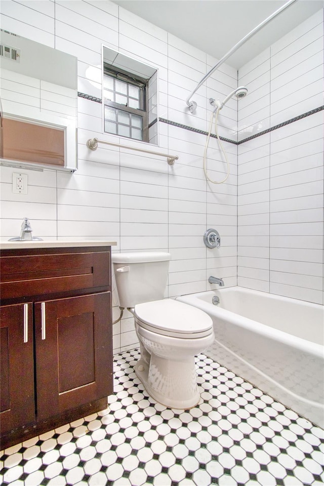 151 Noll St, Brooklyn, NY 11206 - full bath featuring toilet, tile patterned flooring, shower / bath combination, and vanity