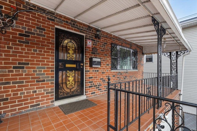 2722 Barnes Ave, Bronx, NY 10467 - property entrance with covered porch and brick siding