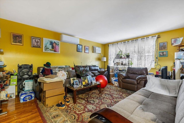 2722 Barnes Ave, Bronx, NY 10467 - living room featuring a wall unit AC, wood finished floors, and an AC wall unit